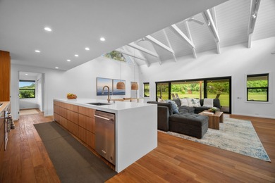 Modern Hawaiian Plantation style residence completed in 2022 and on Kiahuna Golf Club in Hawaii - for sale on GolfHomes.com, golf home, golf lot