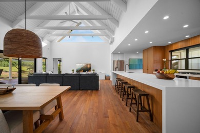 Modern Hawaiian Plantation style residence completed in 2022 and on Kiahuna Golf Club in Hawaii - for sale on GolfHomes.com, golf home, golf lot