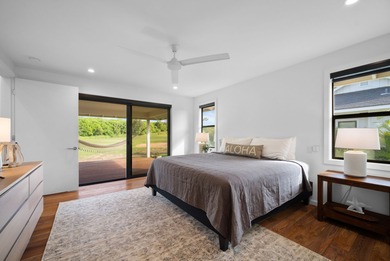 Modern Hawaiian Plantation style residence completed in 2022 and on Kiahuna Golf Club in Hawaii - for sale on GolfHomes.com, golf home, golf lot