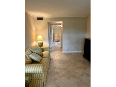 Welcome to 84 Crooked Tree Lane in beautiful Vero Beach! Located on The American Golf Club in Florida - for sale on GolfHomes.com, golf home, golf lot