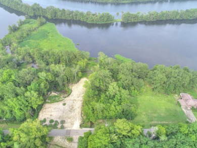 Enjoy the beauty of a half-acre lot on the Cooper River, just 5 on Berkeley Country Club in South Carolina - for sale on GolfHomes.com, golf home, golf lot