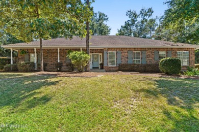 Beautifully Maintained 4-Bedroom Home sitting on two on Diamondhead Country Club in Mississippi - for sale on GolfHomes.com, golf home, golf lot