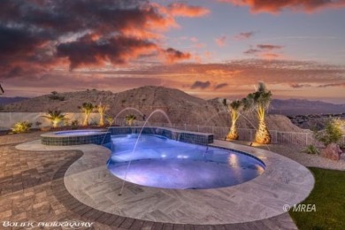 Positioned atop a scenic ridge, this impeccable home provides on Falcon Ridge Golf Course in Nevada - for sale on GolfHomes.com, golf home, golf lot