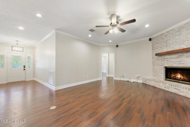Beautifully Maintained 4-Bedroom Home sitting on two on Diamondhead Country Club in Mississippi - for sale on GolfHomes.com, golf home, golf lot