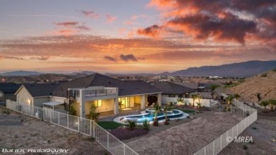 Positioned atop a scenic ridge, this impeccable home provides on Falcon Ridge Golf Course in Nevada - for sale on GolfHomes.com, golf home, golf lot