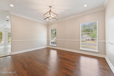 Beautifully Maintained 4-Bedroom Home sitting on two on Diamondhead Country Club in Mississippi - for sale on GolfHomes.com, golf home, golf lot