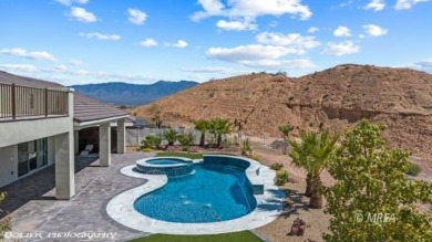 Positioned atop a scenic ridge, this impeccable home provides on Falcon Ridge Golf Course in Nevada - for sale on GolfHomes.com, golf home, golf lot