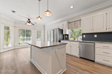 Beautifully Maintained 4-Bedroom Home sitting on two on Diamondhead Country Club in Mississippi - for sale on GolfHomes.com, golf home, golf lot