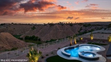 Positioned atop a scenic ridge, this impeccable home provides on Falcon Ridge Golf Course in Nevada - for sale on GolfHomes.com, golf home, golf lot