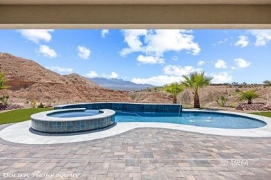 Positioned atop a scenic ridge, this impeccable home provides on Falcon Ridge Golf Course in Nevada - for sale on GolfHomes.com, golf home, golf lot