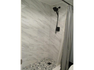 BEAUTIFUL, VERY SPACIOUS CORNER UNIT OFFERING ABUNDANT NATURAL on Sunrise Lakes Phase III in Florida - for sale on GolfHomes.com, golf home, golf lot