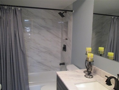 BEAUTIFUL, VERY SPACIOUS CORNER UNIT OFFERING ABUNDANT NATURAL on Sunrise Lakes Phase III in Florida - for sale on GolfHomes.com, golf home, golf lot