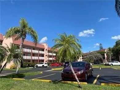 BEAUTIFUL, VERY SPACIOUS CORNER UNIT OFFERING ABUNDANT NATURAL on Sunrise Lakes Phase III in Florida - for sale on GolfHomes.com, golf home, golf lot