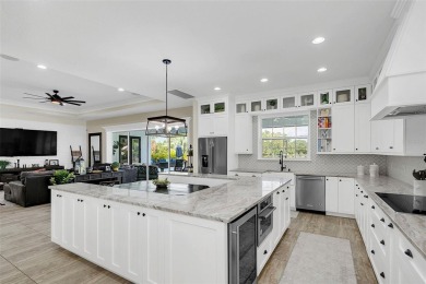 This exquisite 6 bedroom, 4.5 bath modern farmhouse sits on on Wedgefield Golf Club in Florida - for sale on GolfHomes.com, golf home, golf lot