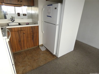 Conveniently located in Waikiki...unit has an enclosed lanai for on Ala Wai Golf Course in Hawaii - for sale on GolfHomes.com, golf home, golf lot