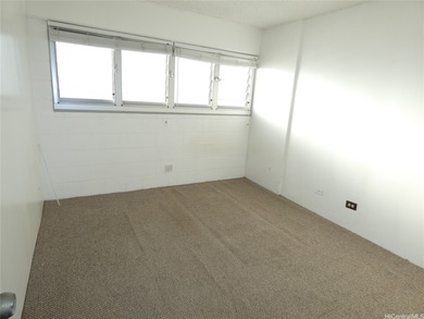 Conveniently located in Waikiki...unit has an enclosed lanai for on Ala Wai Golf Course in Hawaii - for sale on GolfHomes.com, golf home, golf lot