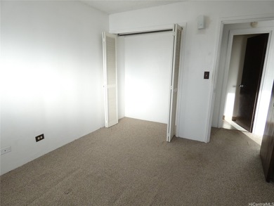 Conveniently located in Waikiki...unit has an enclosed lanai for on Ala Wai Golf Course in Hawaii - for sale on GolfHomes.com, golf home, golf lot