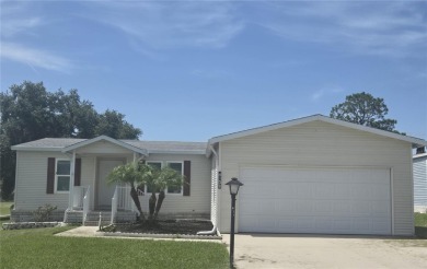 VERY WELL-MAINTAINED GOLF COURSE HOME IN ZELLWOOD STATION! on Zellwood Station Country Club in Florida - for sale on GolfHomes.com, golf home, golf lot