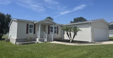 VERY WELL-MAINTAINED GOLF COURSE HOME IN ZELLWOOD STATION! on Zellwood Station Country Club in Florida - for sale on GolfHomes.com, golf home, golf lot