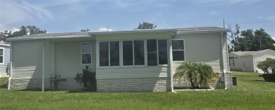 VERY WELL-MAINTAINED GOLF COURSE HOME IN ZELLWOOD STATION! on Zellwood Station Country Club in Florida - for sale on GolfHomes.com, golf home, golf lot