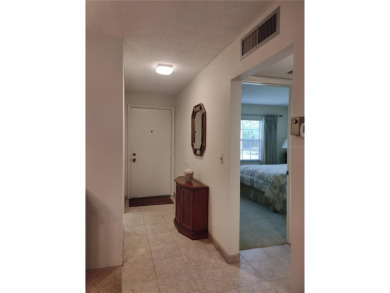 Great opportunity to own a beautifully maintained 2BR/2BA villa on Mainlands Golf Club in Florida - for sale on GolfHomes.com, golf home, golf lot