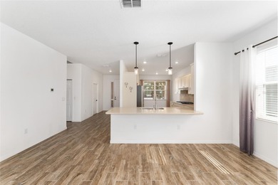 Rare Indigo East Aster Model with Fenced-in Back Yard! This on On Top of the World Golf Course in Florida - for sale on GolfHomes.com, golf home, golf lot