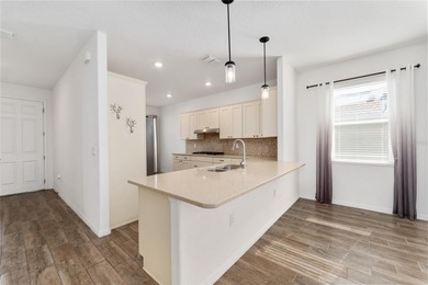 Rare Indigo East Aster Model with Fenced-in Back Yard! This on On Top of the World Golf Course in Florida - for sale on GolfHomes.com, golf home, golf lot