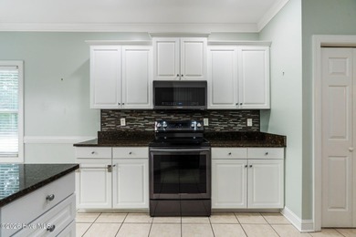 You don't buy a home like this because you need it. You buy it on North Shore Country Club in North Carolina - for sale on GolfHomes.com, golf home, golf lot