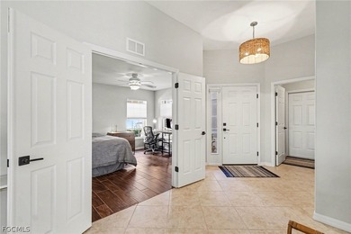 If you are seeking a perfect, TURNKEY property in Southwest on Colonial Country Club in Florida - for sale on GolfHomes.com, golf home, golf lot