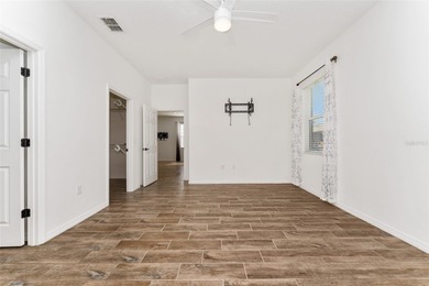 Rare Indigo East Aster Model with Fenced-in Back Yard! This on On Top of the World Golf Course in Florida - for sale on GolfHomes.com, golf home, golf lot