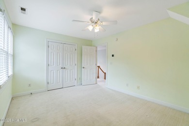 You don't buy a home like this because you need it. You buy it on North Shore Country Club in North Carolina - for sale on GolfHomes.com, golf home, golf lot