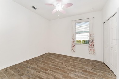 Rare Indigo East Aster Model with Fenced-in Back Yard! This on On Top of the World Golf Course in Florida - for sale on GolfHomes.com, golf home, golf lot