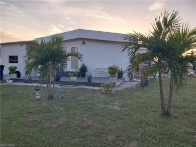 Great doublewide manufactured home on owned land with a private on Pelicans Nest Golf Club in Florida - for sale on GolfHomes.com, golf home, golf lot