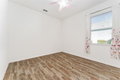 Rare Indigo East Aster Model with Fenced-in Back Yard! This on On Top of the World Golf Course in Florida - for sale on GolfHomes.com, golf home, golf lot