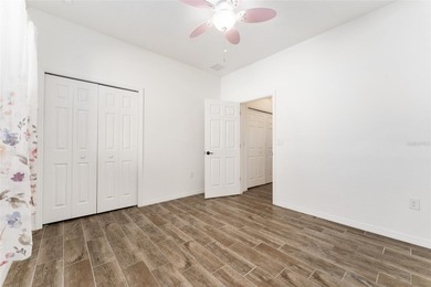 Rare Indigo East Aster Model with Fenced-in Back Yard! This on On Top of the World Golf Course in Florida - for sale on GolfHomes.com, golf home, golf lot