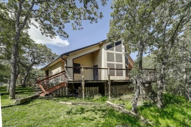 Discover the charm of this unique Ralph Lauren Cottage-inspired on Nocona Hills Golf Course in Texas - for sale on GolfHomes.com, golf home, golf lot