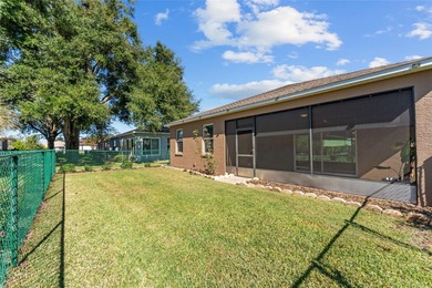 Rare Indigo East Aster Model with Fenced-in Back Yard! This on On Top of the World Golf Course in Florida - for sale on GolfHomes.com, golf home, golf lot
