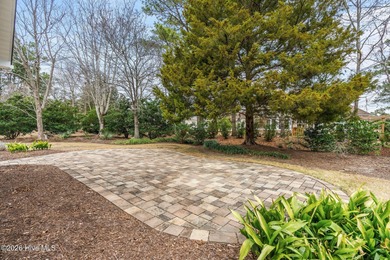 You don't buy a home like this because you need it. You buy it on North Shore Country Club in North Carolina - for sale on GolfHomes.com, golf home, golf lot