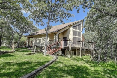 Discover the charm of this unique Ralph Lauren Cottage-inspired on Nocona Hills Golf Course in Texas - for sale on GolfHomes.com, golf home, golf lot