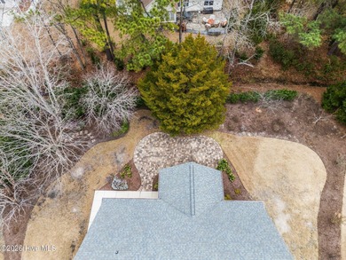 You don't buy a home like this because you need it. You buy it on North Shore Country Club in North Carolina - for sale on GolfHomes.com, golf home, golf lot