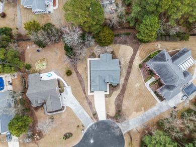 You don't buy a home like this because you need it. You buy it on North Shore Country Club in North Carolina - for sale on GolfHomes.com, golf home, golf lot