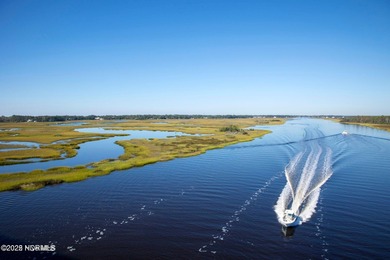 Welcome to a Southport gem where charm, history, and comfort on The Lakes Country Club in North Carolina - for sale on GolfHomes.com, golf home, golf lot