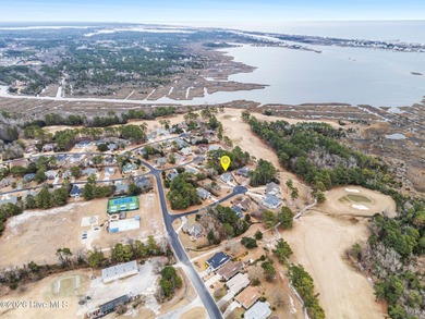 You don't buy a home like this because you need it. You buy it on North Shore Country Club in North Carolina - for sale on GolfHomes.com, golf home, golf lot