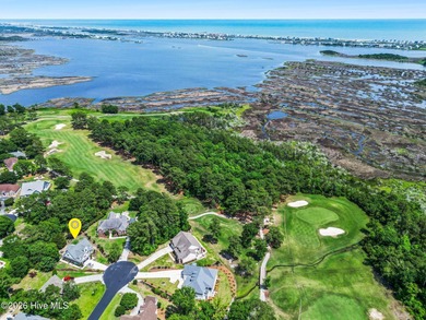 You don't buy a home like this because you need it. You buy it on North Shore Country Club in North Carolina - for sale on GolfHomes.com, golf home, golf lot