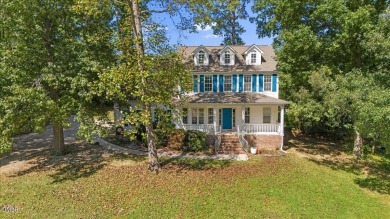 Beautifully updated and designed with timeless Southern charm on The Neuse Golf Club in North Carolina - for sale on GolfHomes.com, golf home, golf lot