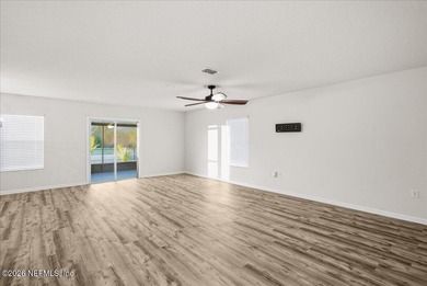 Located in the golf-cart-friendly Grand Reserve Golf Community on Grand Reserve Golf Course in Florida - for sale on GolfHomes.com, golf home, golf lot