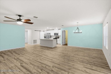 Located in the golf-cart-friendly Grand Reserve Golf Community on Grand Reserve Golf Course in Florida - for sale on GolfHomes.com, golf home, golf lot