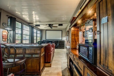 This unique two-bedroom, two-bath home in the gated, golf-course on Lake Fairways Country Club in Florida - for sale on GolfHomes.com, golf home, golf lot