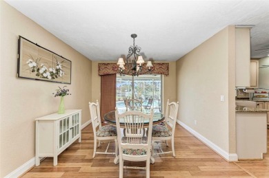 Beautifully updated 3 bedroom, 2 bathroom pool home with dock on on Saint Andrews South Golf Club in Florida - for sale on GolfHomes.com, golf home, golf lot