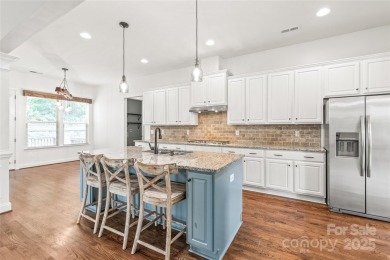 Discover timeless elegance in this full-brick stately Skybrook on Skybrook Golf Club in North Carolina - for sale on GolfHomes.com, golf home, golf lot